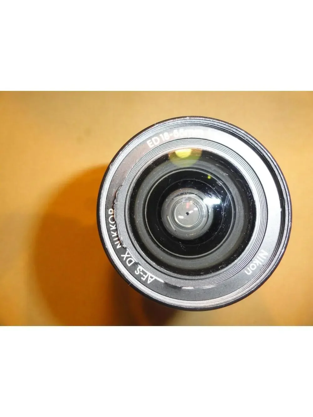 NIKON DX SWM ED ASPHERICAL 0.28M/0.92FT 52 US 6766543 18-55 MM 1:3.5-5.6 G II